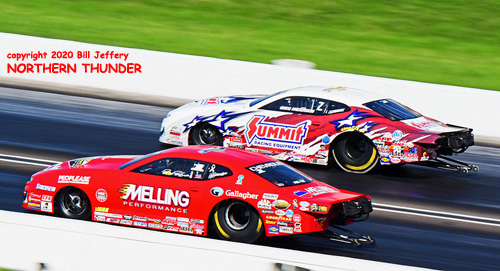 (near lane) Erica Enders vs (far lane) Greg Anderson